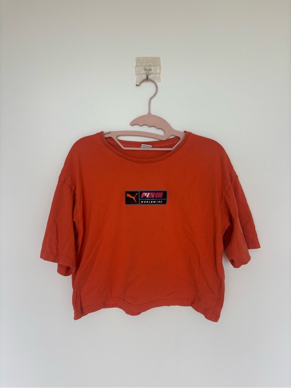Puma Orange Short Sleeve Crop Tee with Center Patch Logo